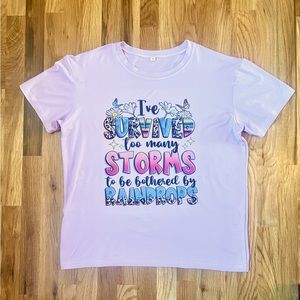 "I've Survived Too Many Storms to be Bothered by Raindrops" Graphic T-shirt,L/XL
